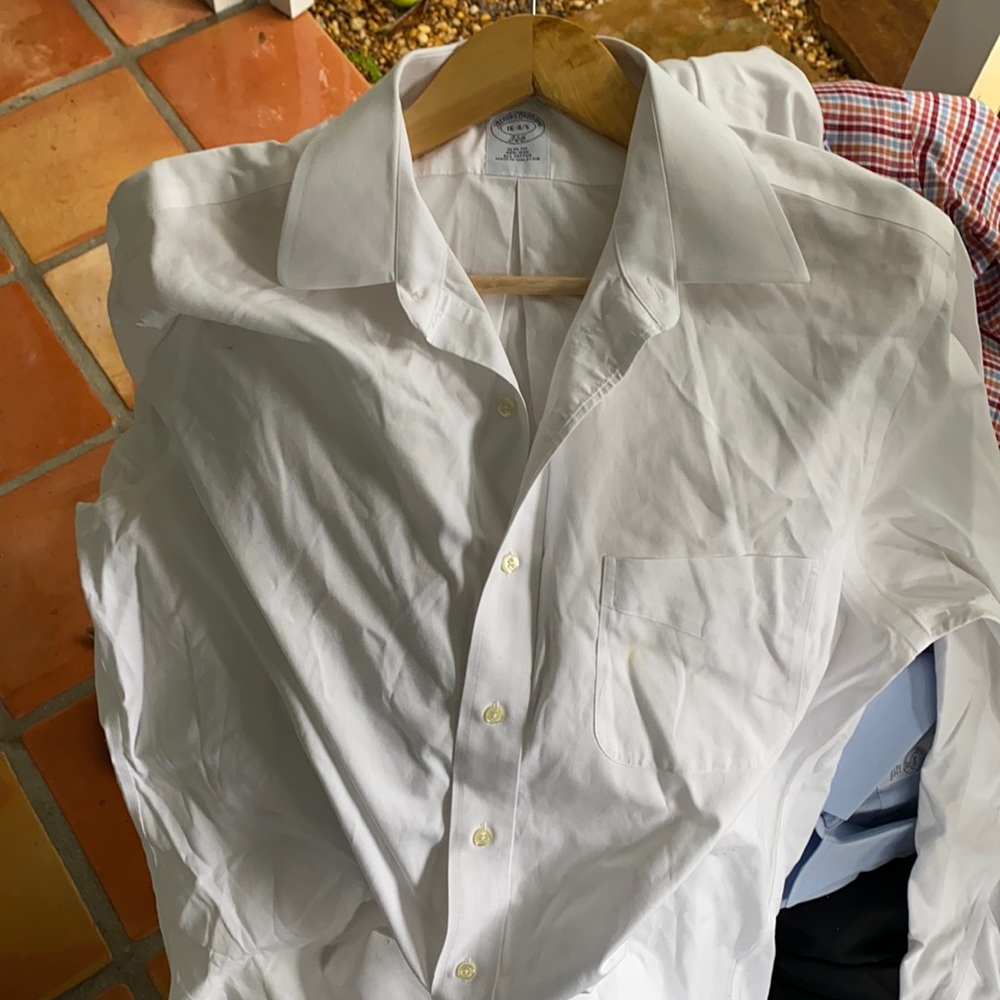 Clean dry cleaned white button down